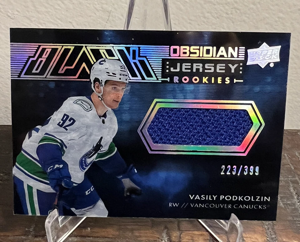 2021-22 UD SPX VASILY PODKOLZIN BLACK OBSIDIAN ROOKIE JERSEY/399 CANUCKS - Image 1 of 2