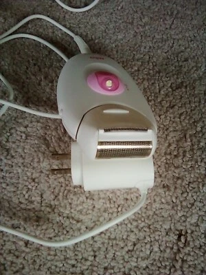 Afeitadora Braun 2 en 1 doble cabezal para dama Foto 1 de 2