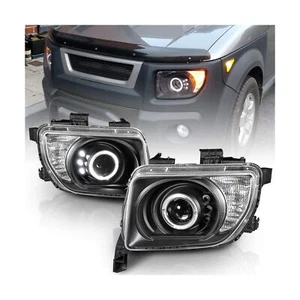 AmeriLite Projector Headlights Halo Black for Honda Element - Passenger and D... - Picture 1 of 6