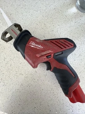 Milwaukee M12 Hackzall Reciproca Saw! Battery And One Blade! Works Well! - Image 1 of 2