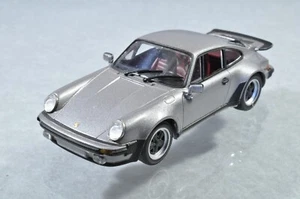 BG387 Minichamps 430.069004 1:43 1977 Porsche 911 Turbo (930) meteor silver A/- - Imagen 1 de 3