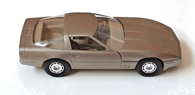 Bronze 1984 Chevy Corvette 1:25 Plastic ERTL AMT Dealer Promo Model New In Box - Image 1 of 4