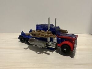 Hasbro Transformer DOTM Streetside Bot Brawl Voyager Optimus Prime With Guns