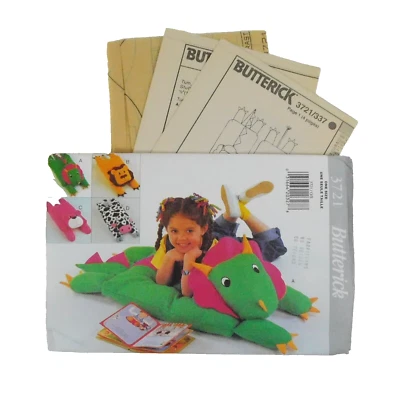 Butterick 3721 Craft Animal Pillow Cover Sewing Pattern Dinosaur Lion Cow Bear - Image 1 of 4