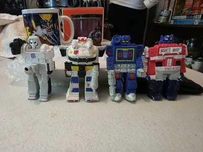1985 Hasbro Transformers Erasers 4 Piece Jazz Optimus Soundwave Megatron Rubber - Image 1 of 4