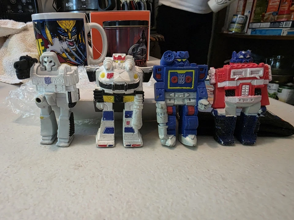 1985 Hasbro Transformers Erasers 4 Piece Jazz Optimus Soundwave Megatron Rubber - Image 1 of 4