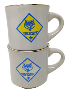 VTG Cub Boy Scouts Coffee Mug Cup Restaurantware Wolf Badge Logo Gold Trim Set 2 - Picture 1 of 10