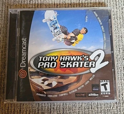 Tony Hawk's Pro Skater 2 (Sega Dreamcast, 2000) Disco de juego, estuche y manual Foto 1 de 3