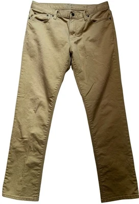 Pantalones de mezclilla elásticos de viaje ajustados Banana Republic para hombre talla 33x32 marrón liso Foto 1 de 4