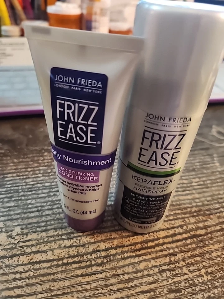 Acondicionador JOHN FRIEDA Frizz Ease 1,5 OZ, spray para el cabello 2 OZ Foto 1 de 1