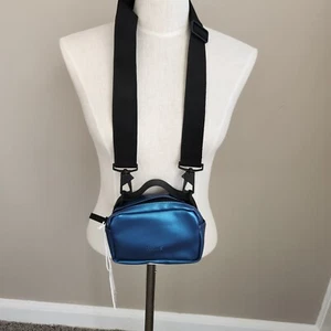 RAINS Micro Waterproof Crossbody Bag - laser blue Color MSRP $95 NWT - Picture 1 of 4