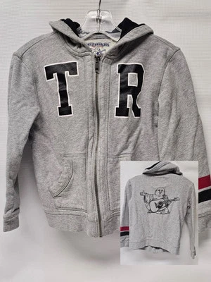 Sudadera con capucha y cremallera TRUE RELIGION para niños usada talla 5 Foto 1 de 4