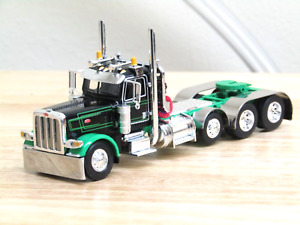 DCP black/green Peterbilt 389 daycab 4 axle tractor new no box 1/64...