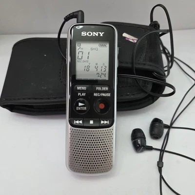 Grabadora de voz digital Sony ICD-BX140 4 GB funcionando con estuche y auriculares Foto 1 de 4