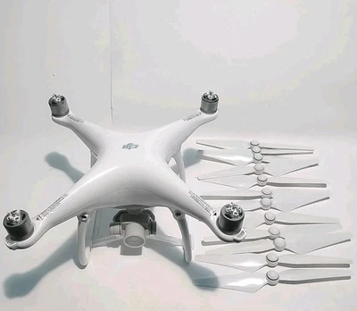 DJI Phantom 4 Drone w/12 Propellors Camera. No Batt/Remote/Charger. - Image 1 of 4