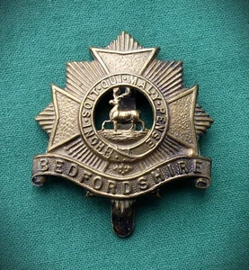 Primera Guerra Mundial El Regimiento de Bedfordshire, "Economía" Genuino Ejército Británico Militar Gorra Insignia - Imagen 1 de 8