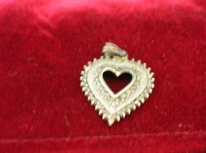 Sterling silver heart pendant with small round diamonds set around inner heart - Picture 1 of 5