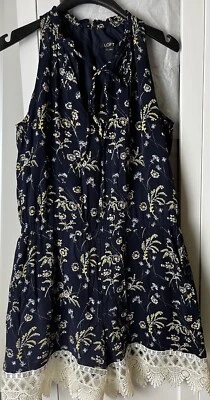Mameluco floral Ann Taylor LOFT para mujer talla M azul marino con bolsillos cuello atado Foto 1 de 4