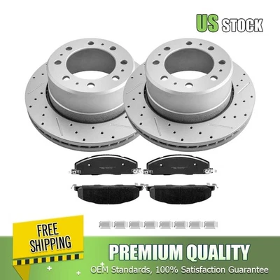 Rotores ranurados perforados traseros y pastillas de freno de cerámica para Dodge Ram 2500 3500 8 orejetas Foto 1 de 4