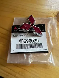 Genuine Mitsubishi OEM Mark Diamond. Brand New. MB696029 - Picture 1 of 1