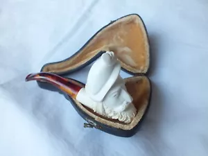 An unsmoked, cased, meerschaum pipe carved as a mans head with a feather - Picture 1 of 9