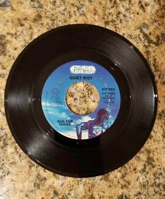 QUIET RIOT RUN FOR COVER/CUM ON FEEL THE NOIZE, PASHA RECORDS 45RPM, 1983. - Image 1 of 4