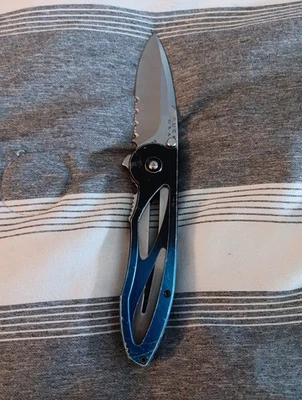 2004 Buck 295 Assisted Opening with Combo Edge Folding Knife Made In USA - Image 1 of 3