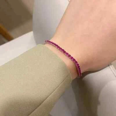 Brazalete de tenis para mujer de rubí rojo creado en laboratorio de corte redondo de 6 quilates enchapado en oro blanco de 14 quilates Foto 1 de 4