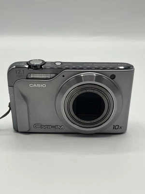 Casio Exilim EX-H10 Silber-Kompakte Digitalkamera 10X Optical zoom 12,1MP (K37) - Bild 1 von 4