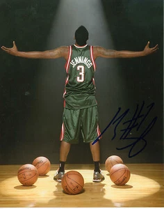 BRANDON JENNINGS SIGNED MILWAUKEE BUCKS 8" x 10" PHOTO W/ COA DETROIT PISTONS - Picture 1 of 1