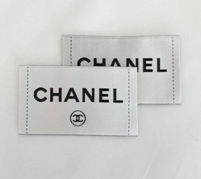 Two (2) Chanel Clothing Label Tag Sewing Replacement White 2.75"x1.25"(70x40mm) - Image 1 of 4