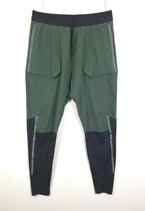 Pantalones de correr Nike Tech Pack negros verdes BV5695 para hombre talla M 32-34 - Imagen 1 de 16