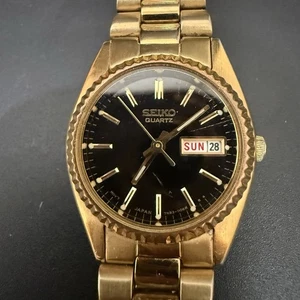 Orologio Donna Vintage SEIKO 7N83-0041 Presidenziale Oro Quadrante Nero Data Giorno 24mm - Foto 1 di 18