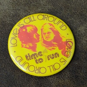 Vintage Pinback "Love Is All Around" Time to Run 2.25 Inch - Picture 1 of 2