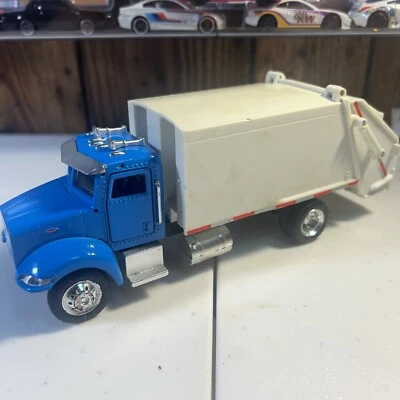 New Ray 1:43 Scale Peterbilt Model 335 Blue Garbage Truck Die Cast Model - Image 1 of 4