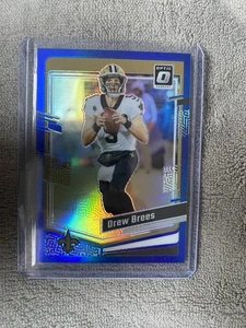 2023 Panini Donruss Optic Drew Brees Blue Prizm /199 New Orleans Saints #135 - Bild 1 von 2
