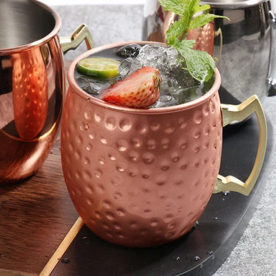 Confezione da 4 tazze Moscow Mule - tazze in rame martellato con manici in ot... - Immagine 1 di 4