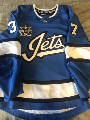 Winnipeg Jets Connor Hellebuyck Aviator Third Jersey Adidas MiC Size 56 Cover