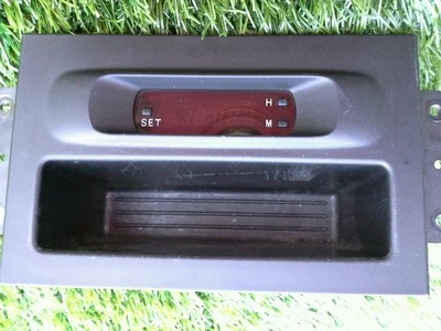 RELOJ MITSUBISHI MONTERO LIMITED 2000-2006 TABLERO CENTRAL CON ADORNO NEGRO OEM Foto 1 de 3