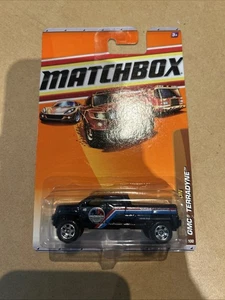MATCHBOX GMC TERRADYNE BLACK LONG CARD 2010 CONSTRUCTION - Picture 1 of 2