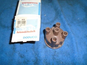 Audi 50, VW Derby, Polo Mk1, Mk2 1975-85, Golf Mk1 NOS Doduco Distributor Cap - Picture 1 of 3