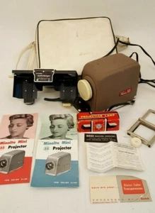 Vintage Minolta mini 35 projector + case + autocharger + projection lamp bulb - Picture 1 of 12