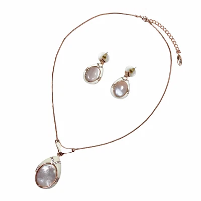 Conjunto de joyería colgante blanco con incrustación de cristales de diamantes de imitación enchapados en oro rosa Foto 1 de 4