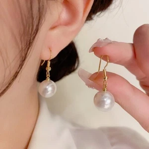 Orecchini con gancio di perle riempite in oro 14 kt - Foto 1 di 6