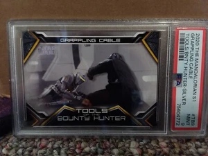 TOPPS THE MANDALORIAN GRAPPLING CABLE PSA 9 SILVER 12/25 - Bild 1 von 2