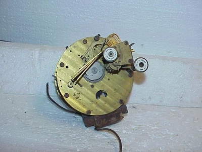 Antique 4 Inch Round Electric Striking Clock Movement parts repair J - Image 1 of 4