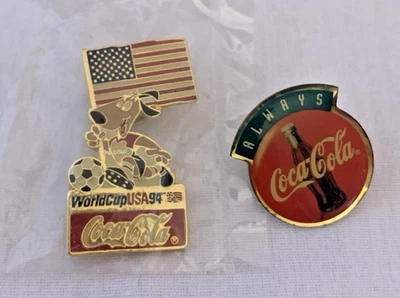 Lot of 2 Vintage Goldtone Enamel CocaCola Lapel Pins-1994 World Cup Marked - Image 1 of 4