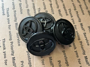 Black Toyota Set Of 4 Wheel Center Caps 57MM - Picture 1 of 3