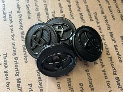 Black Toyota Set Of 4 Wheel Center Caps 57MM - Image 1 of 3