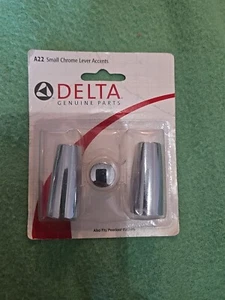 Un par de acentos de mango de palanca pequeña Delta A22 en cromo - Imagen 1 de 2